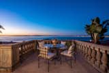 The outdoor terrace looks out to the Pacific Ocean through to Malibu and is ideal for entertaining or relaxing with loved ones with its own lounge, outdoor kitchen, and barbecue areas.