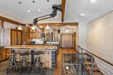 Kitchen Inspired by the craftsmanship and detail of mill and steel work, the home’s careful attention to engineering and thoughtful features stand it apart from other properties in the area.  Photo 2 of 4 in Big Sky Living at Bridger Range by Luxury Homes & Lifestyle