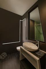 A geometric line of light brings modern art to this bathroom  Photo 2 of 8 in Bath & Vanity by PureEdge Lighting