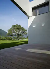 Energy efficient lighting solutions make this outdoor oasis an extension of the home.