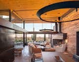 Living Room, Wood Burning Fireplace, Sofa, and Standard Layout Fireplace Great Room looking South  Photo 8 of 26 in Saguaro Ridge/Orem Residence by Douglas Fredrikson