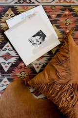 Our Elka Fringe Pillow in color Saddle with her favorite records!