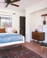 The Combs curated all furnishings from from their favorite designers and flea market finds.  Suede Fringe Pillow by Lasso Abode, Textile by APPRVL and Print by Sara Combs.