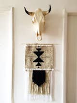 Hang your steer up high!  Found this cute styling of steer and wall hanging on Etsy.  Photo 6 of 7 in COZY UP 2017 // CABIN STYLE IN THE BEDROOM! by Lasso Abode
