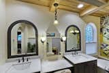 his & hers vanities with makeup station in between