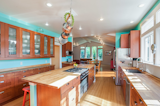 New kitchen uses color in a big way  Photo 6 of 7 in Massive Addition does not over-whelm by Island Architecture