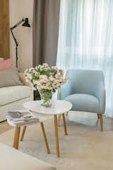 Working on a budget is no easy thing, but with the clever eye of an interior designer, every space can become a home. Having in mind that great design doesn't stand out, it only makes your living environment more pleasant, the designer has chosen soft lines, neutral colors and some small pastel accents.