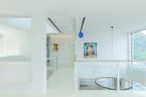 1st Floor gallery overlooking living room below  Photo 10 of 13 in Cheng House by Ho + Hou Studio Architects