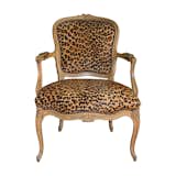 Available on viyet.com

JF Chen, one of L.A.’s premier design sources, offers furniture and decorative arts from eclectic period pieces to masterworks of the twentieth and twenty first centuries. This classic Louis XV style chair has fine hand-carved details. Beautifully upholstered in a leopard hide with nailhead trim, it is an elegant addition to any interior.

https://viyet.com/vintage-louis-xv-style-fauteuil-sea-16514-9011.html
