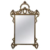 Available on viyet.com

This antique mirror is a beautiful example of Italian craft. An intricately carved wooden frame was artfully gilt in gold to lend it a rich appearance. Ideal for a traditional living room, entryway, or study.

https://viyet.com/vintage-italian-gilt-mirror-acc-20440-11501.html

