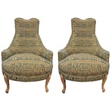 Available on viyet.com!

These vintage lounge chairs have a bold, eclectic style. Their cotton upholstery is woven with a vibrant pattern of blue, done on a subtle peach background. Sold in a set of two.

https://viyet.com/vintage-upholstered-lounge-chairs-sea-20408-11627.html


