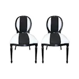 Available on viyet.com!

This vintage chair offers maximum style and understated elegance. Here, black and white cotton duck upholstery is accented with grosgrain ribbon. Sold in a set of two.

https://viyet.com/louis-xvi-black-lacquered-chairs.html

