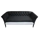 Available on viyet.com

Schumacher is one of the most distinguished textile suppliers in the design world, having been in business since 1889. This black and white sofa features a tufted back and nickel cup casters. The tufting adds visual interest to this simple yet elegant piece.

https://viyet.com/black-and-white-tufted-love-seat.html
