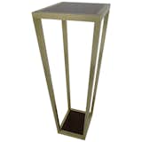 Available on viyet.com!

This vintage pedestal table has clean lines that perfectly complement modern tastes. Taller than average, the metallic frame is made from aluminum, which features a dark wood top and base. Ideal for a contemporary design setting.

https://viyet.com/vintage-tall-aluminum-and-wood-pedestal-acc-20624-11399.html

