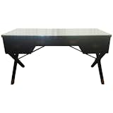 Available on viyet.com!

Since 1911, Hickory Chair has maintained an old-school dedication to fine craftsmanship, particularly when it comes to upholstery. Taking on a vintage modern French-inspired form, this dark mahogany three-drawer desk boasts polished brass hardware and a unique X frame. This piece includes a protective clear glass top (though it is not original to the desk).

https://viyet.com/hickory-chair-asheworth-campaign-desk-tab-20551-11428.html

