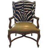 Available on viyet.com!

Ralph Lauren is known for his iconic take on classic American style and cultivating the most beautiful items for the home. This regal chair has an intricately carved wood frame, vibrant zebra-print back, and plush leather seat. It is an eclectic piece that will be an effortless focal point in any décor.

https://viyet.com/ralph-lauren-spencer-chair-sea-19759-1558.html
