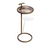 SOREN CIRCULAR DRINK TABLE

A versatile iron drink table has never been chicer thanks to its fabulous brown vellum top and antique brass finish.