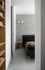 master bedroom - concrete wall