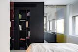 the bedroom & a view to the kitchen