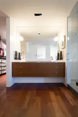 master bathroom - vanity featuring crisp sconces by rich, brilliant, and willing