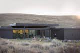 The three structures physically connect only via the canopy and outdoor living patio in order to allow views and cross breezes to abound.