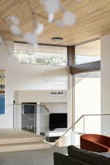Light and airy sculptural pendants are used throughout to reduce obstruction of views as much as possible.