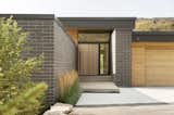 Layers of architecture sweep guests into the main entry.