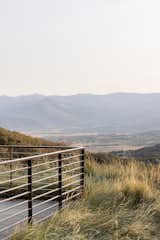 Grasses planted along the rooftop perimeter also help to screen the view from development below.