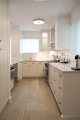 OPEN DINING ROOM - CONTEMPORARY NYC RENOVATION: We love a challenge! With plumbing and electric issues that provided more than a few design dilemmas to solve, this kitchen is now one of the crown jewels of the renovation. Clean and beautiful, and boasting more than ample storage, user friendly full size appliances and great work flow, it's truly a delight to cook in. And boy, do our clients love to cook!