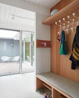 Entry from the garage with powder room adjacent