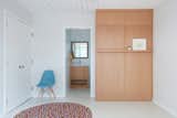 The separate home office is accessed from the front courtyard and doubles as a guest suite with a built-in Murphy bed