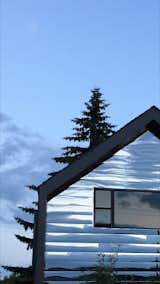 Exterior, Apartment Building Type, and Metal Siding Material South Elevation - Evening Reflection  Photo 2 of 14 in Calder Laneway House - Edmonton by Jesse Watson