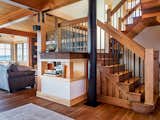 Rich wood details in the open floor-plan first floor