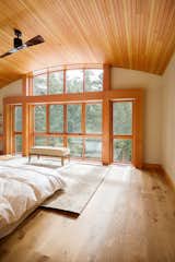 Perfect Master Bedroom with light wood, lake views and arched ceiling