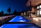 25 yard lap pool with modern fire-pit