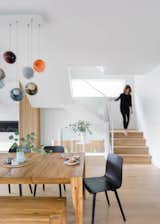 The interior spaces of the home follow the minimal intent of the architecture. The spaces are designed for adaptability for each members of the family, including a parlour for music and entertaining, a gaming dungeon for the teenagers, a large entry mudroom at the front door for everyday things.