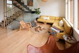 living with custom couch and steel and ply staircase
