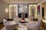 In actress Denis Richards’ Hollywood residence, Wall Series wine racks in Brushed Nickel finish store bottles, label-forward, in two glass-enclosed wine cases. 