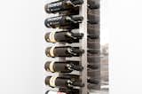 Floor to Ceiling Frames allow for the installation of Wall Series metal wine racks against glass in wine cellars.