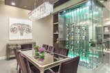Floor to Ceiling Frames allow for the installation of Wall Series metal wine racks against glass in wine cellars, creating stunning décor pieces in living rooms and dining areas.