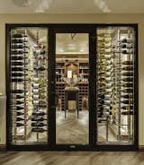 Floor to Ceiling Frames allow for the installation of Wall Series metal wine racks against glass in wine cellars. 