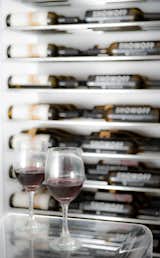 Evolution wine rack kits are a freestanding option that uses steel and acrylic that results in a hyper contemporary style for living rooms or wine cellars.