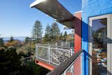 Cantilevered decks, Cessna Skymaster wings, custom railings overlooking the bay.  