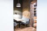 Dining Room, Bench, Table, Pendant Lighting, Lamps, Desk, and Wall Lighting  Photo 15 of 18 in Startup office in Prezlauer Berg by Maxim Kurennoy