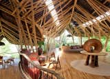 Built almost entirely with locally-sourced bamboo, the Green Village residential community in Ubud, Bali, is a sculptural house designed by Elora Hardy of Ibuku. It's available to rent through Airbnb.