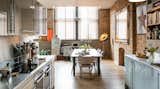 With exposed brick walls, an old metal work desk and roof terrace herb garden, Ny-Lon, located in a warehouse building in Shoreditch, brings a touch of working-class cool to your stay.  Photo 5 of 10 in Soak Up the Creative Vibes of London’s East End at One of These Rental Homes or Hotels