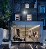 Outdoor, Small Patio, Porch, Deck, and Wood Patio, Porch, Deck  Photos from Transparent Perforated Circles Bring Light and Movement to This London Terrace House