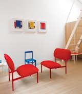Just outside the Bethnal Green home of industrial designer Nina Tolstrup and her husband, Jack Mama, is this wonderfully vibrant guesthouse they designed with  red chairs made from castoffs as part of Tolstrup’s Re-Imagine series, and a small blue Pallet chair from Studiomama.  Photo 7 of 10 in 9 Small Spaces With  Color