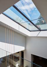 In Chicago’s Buena Park neighborhood, dSPACE Studio transformed a disorganized 1978 home into a bright, open residence with an expansive, 20-foot skylight in the atrium.
