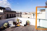 Outdoor, Wood Patio, Porch, Deck, Flowers, Rooftop, and Decking Patio, Porch, Deck  Photo 4 of 37 in Outdoor by Lorenzo Camisassi from You Can Rent This Small Sicilian Apartment For $94 a Night